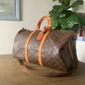 Authentic Louis Vuitton Keepall 50 Bando in Monogram